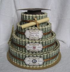 a graduation cake made out of stacks of money