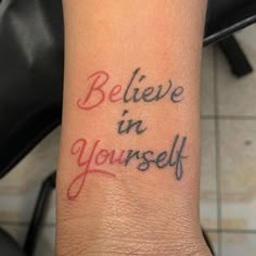 a wrist tattoo with the words believe in yourself on it's left side arm