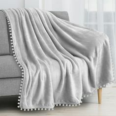 a couch with a blanket on top of it