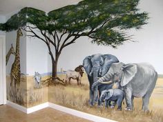 an elephant and giraffe mural in a child's room