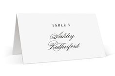 a table number card with the words, wedding and date printed on it in black ink