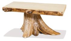 a wooden table that has been carved into the shape of a tree trunk and is made out of wood