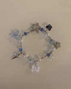 This cute blue fairycore bracelet is adorned with butterflies and stars. Dark blue beads with white pearls gives it it's starry night aesthetic. IMPORTANT: Make sure this bracelet is your size. It is 7 inches and the size can't be readjusted due to toggle clasp. To make sure it fits you take a measuring tape and put it around your wrist. From there you can decide if this bracelet size is right for you :) Blue Bracelet Ideas, Fairycore Bracelet, Starry Night Aesthetic, Blue Beads Bracelet, Dark Blue Bracelet, Blue Starry Night, Blue Bracelets, Girly Bracelets, Amulet Bracelet