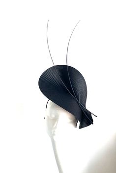 Black Feather Saucer Disc Hat This lovely black Feather Saucer Disc will be perfect for royal ascot and Kentucky derby.  Black Feather Saucer Disc Hat will be an amazing accessory to compliment your outfit. It's elegant and simple. Black Feather saucer disc hat will fit the average head size. Its made from silk covered metal headband attached to the black saucer base on which sits two feathers. To secure your fascinator there is a comb inside the hat attached to the headband, so the fascinator s Black High Crown Hat For Formal Occasions, Black High Crown Costume Hat For Formal Occasions, Formal Black High Crown Costume Hat, Formal Black Brimmed Costume Hats And Headpieces, Formal Black Costume Hats With Curved Brim, Fitted Black Top Hat For Formal Occasions, Black Fitted Top Hat For Formal Occasions, Black Formal Costume Hat With Curved Brim, Black Top Hat With Short Brim For Formal Occasions