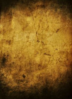 an old grungy textured paper background with space for text or image