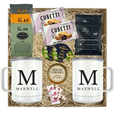 the coffee gift box includes two mugs, candy and other items to make it look like