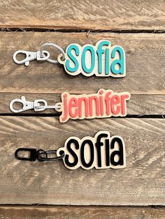 three wooden name tags with the words sofia, jenny and softa on them