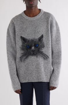 A shadowy cat with icy blue eyes takes center stage on a roomy sweater knit from a mohair-warmed blend. Crewneck Long sleeves Dropped shoulders Ribbed cuffs and hem 50% mohair, 40% polyamide, 8% viscose, 2% wool Dry clean Made in Italy Designer Clothing Knit Cat Sweater, Icy Blue Eyes, Knitted Art, Cat Sweater, Knitted Cat, Knit Art, Embroidery Sweater, Icy Blue, Fabric Gift Bags