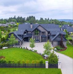 an aerial view of a large home in the suburbs