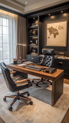 an office with black leather chairs and a large desk in the middle of the room