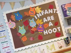 a bulletin board with owls and leaves on it that says infants are a hoot