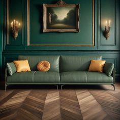 a living room with green walls and wood flooring is pictured in this image, there are candles lit on the wall