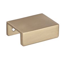 an image of a brushed brass cabinet handle