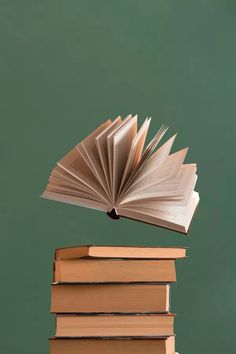 a stack of books sitting on top of each other