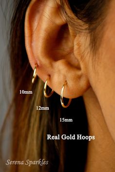 10k Solid Gold Continuous Hoops Available in Three Different Small Sizes 10mm, 12mm, 15mm. These Are Real Gold Daily Wear Sleeper Hoop Earrings For A Minimalist Look. Everyday Dainty Solid Gold Hoop Earrings Can Be A Perfect Gift For Your Loved Ones. Each Earring Is Stamped 10k To Prove Its Authenticity. Metal: Solid Gold Gold Purity: 10k Stamp: 10k Made : Made In Italy Thickness : 1.2 mm (All Are Equal In Thickness) Piercing Post Gauge : 0.6mm   PURCHASING OPTIONS  Single Piece - Refers to 1 in Real Gold Hoop Earrings, Double Piercing, Geek Jewelry, Dragon Jewelry, Eco Friendly Jewelry, Nose Stud, Gold Hoops, Earrings Etsy, Jewelry Earrings Hoops