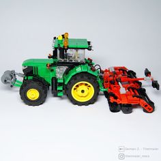 there is a lego tractor and two other toys