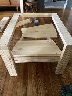 a wooden chair sitting on top of a hard wood floor