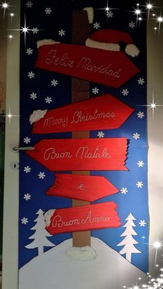 a door decorated with christmas signs and snowflakes