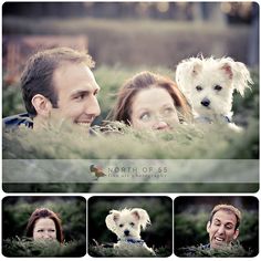 a man and woman laying in the grass with their dog