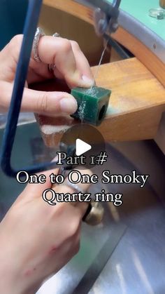 someone is working on something with the words part 1 one to one smoky quartz ring