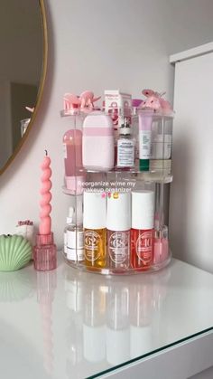 there is a shelf with bottles and soaps on it in the bathroom next to a mirror