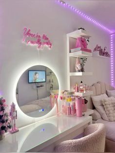 a white room with pink lights and decorations