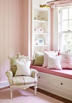 a room with pink walls and white furniture in the center is featured on instagram