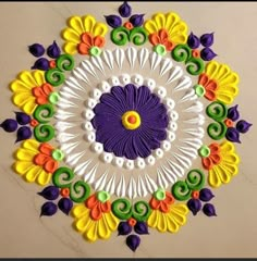 a colorful circular design on the wall