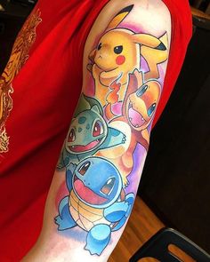 a man with a pokemon tattoo on his arm