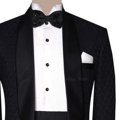 Elevate your formal attire with this superb pure karandi black tuxedo suit. Crafted with meticulous interest to element, this custom-made masterpiece features difficult embroidery and a wonderful match. Perfect for special occasions, weddings, or black-tie occasions, this tuxedo exudes timeless beauty and sophistication. Fitted Designer Formal Sets, Designer Fitted Formal Sets, Fitted Designer Sets For Formal Occasions, Luxury Fitted Sherwani For Semi-formal Occasions, Luxury Fitted Formal Sets, Elegant Tuxedo For Black-tie Festive Events, Tailored Sets For Black-tie Festive Events, Black Fitted Bandhgala For Semi-formal Occasions, Long Sleeve Tuxedo For Black-tie And Festive Events