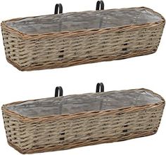 two wicker baskets with handles on each side