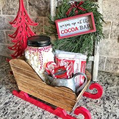 a wooden sleigh filled with candy and candies