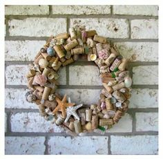 a wreath made out of wine corks and shells