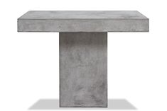 a concrete table sitting on top of a white floor