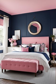 a bedroom with blue walls and pink accents