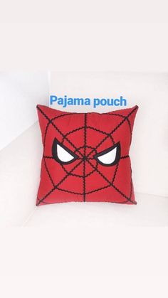 the pillow is made to look like a spider man