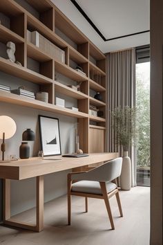 a home office with wooden shelving and white chairs in front of a large window