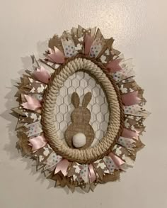 a bunny wreath hanging on the wall