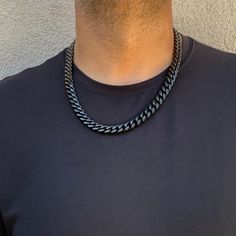 This is a listing for a Black Ion Plated Stainless Steel Cuban Link Chain with a secure and easy to use lobster clasp closure. Perfect to wear alone or layer with your favorite pendant. Stainless Steel is very durable and does not tarnish. You will love the look and feel of this chain. A matching bracelet is shown in one of the pictures but listed separately. https://etsy.me/31wBRXB The Cuban Link Chain is unisex and I can make the chain any length you like. The Cuban Link Chain Collection has m Black Cuban Link Jewelry With Curb Chain, Black Cuban Link Curb Chain Jewelry, Black Cuban Link Chain Necklace Gift, Black Cuban Link Chain Necklace, Black Chunky Link Chain Necklace, Black Link Chain Jewelry, Black Curb Chain Jewelry For Gift, Black Chain Link Necklace, Black Cuban Link Jewelry With Box Chain