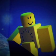 a lego man with a smile on his face