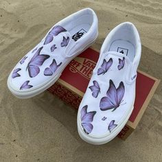 Fly away with our Custom Printed Butterfly Vans!  The Purple Butterfly Pattern is printed all over the White Slip on Vans. Custom Made-to-Order shoes. Designed by Blake Barash. We buy each pair of shoes BRAND NEW. Each pair is made to order, please make sure you put in the correct shoe size before you check out. The paint is permanent and will never come off, fade away, or peel off. Made in the USA. This price includes everything: shoes, artwork, and shipping. Thanks for stopping by our Etsy sho Shoe Painting Ideas Vans, Painting Vans, Butterfly Vans, Custom Slip On Vans, Shoes Artwork, Teen Shoes, White Slip On Vans, Shoe Painting