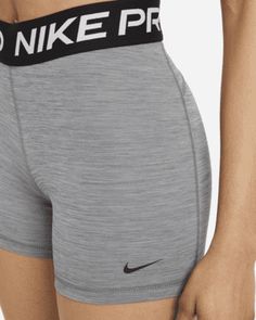 The Nike Pro 365 Shorts wrap you in stretchy fabric with Dri-FIT technology to keep you feeling supported and dry during intense workouts. This product is made with at least 50% recycled polyester fibers. Shown: Smoke Grey/Heather/Black/Black Style: CZ9831-084 Cute Nike Pro Outfits, Nike Pro Outfits, Nike Pros Aesthetic, Cheer Essentials, Cute Nike Pros, Nike Pro Collection, Nike Pro Spandex Shorts, Grey Nike Pros, Gymwear Outfits