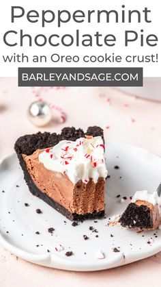 a slice of peppermint chocolate pie on a white plate with a bite taken out