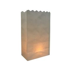 a white paper bag with a light inside