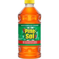 a bottle of pine oil on a white background