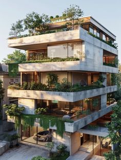 an apartment building with plants growing on the balconies