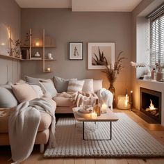 a living room filled with furniture and candles