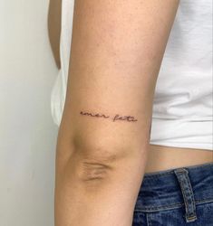 a woman with a tattoo on her arm that says, mama papa in cursive writing