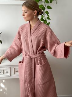 "Waffle Hand Made Kimono style Bathrobe Wrap yourself into the softest waffle robe, ever. Comfortable, high-quality, cosy, and sustainable. Perfect as a gift for any occasion. Made from 100% pure organic Netherlandish cotton. Oeko-Tex Standard 100 Certified ® Enjoy the spa feeling at home! * Soft and comfortable * Absorbent and quick drying * Lightweight and breathable * Durable * Hypoallergenic * 100% cotton waffle  * Easy garment care SIZING Bathrobes are designed for a loose fit: S/M:  - total length (center back length) - 115 cm/45\"; - bust - 60 cm/23.6\"; L/XL:  - total length (center back length) - 115 cm/45\"; - bust - 66 cm/26\"; Models wearing size S/M Girl height 5'61 /168cm C O L O R S: We have a wide selection of colors: https://www.etsy.com/shop/KajStore?ref=seller-platform-m Feminine Long Sleeve Robe For Home, Feminine Long Sleeve Home Robe, Feminine Long Sleeve Kimono For Loungewear, Pink Wrap Kimono For Loungewear, Spa At Home, Cotton Bathrobe, Environmental Consciousness, Mode Kimono, The Spa