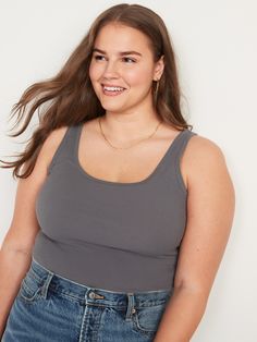 Our First Layer tank top is fitted, flattering & soft.  Great outfits start here ➡️ Scoop neck.  Sleeveless arm openings.  Rib-knit cotton-blend, with comfortable stretch.  @modelsizes 5’9":S | 5'7":L | 5'10":XL @modelsizes Fitted through body. Everyday Solid Scoop Neck Crop Top, Everyday Solid Color Scoop Neck Crop Top, Everyday Ribbed Camisole With Scoop Neck, Everyday Ribbed Scoop Neck Camisole, Casual Ribbed Tops With Scoop Back, Gray Ribbed Scoop Neck Top, Casual Ribbed Scoop Neck Knit Top, Gray Scoop Neck Seamless Top, Gray Seamless Scoop Neck Top